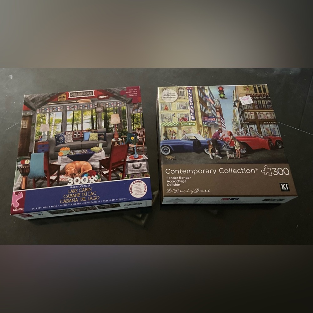 Lot of 2 300-piece Ceaco & KI puzzles